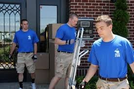 Two Marines Moving professionals at work